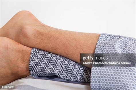 legs crossed  ankle   premium high res pictures getty images