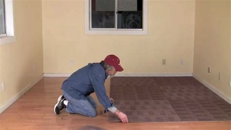 how to put carpet tiles