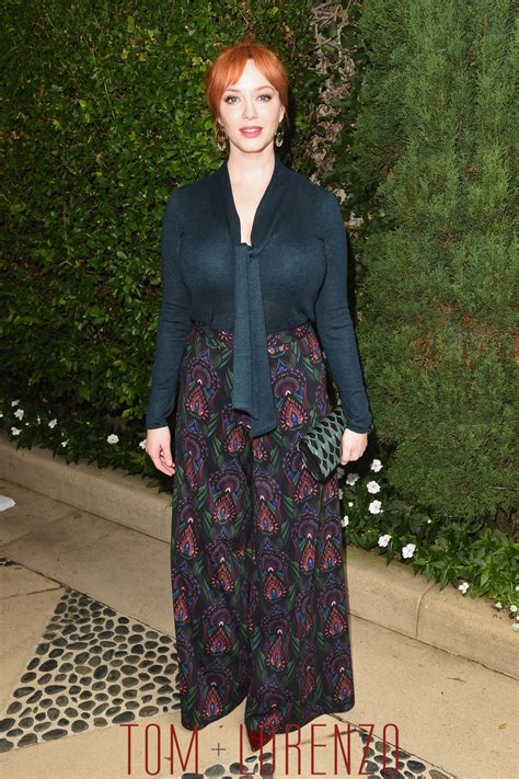 Ladies in Satin Blouses: Christina Hendricks - dark green bow blouse