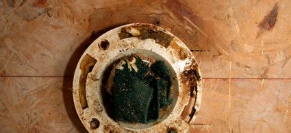 How to Fix a Leaky Toilet Base | DoItYourself.com