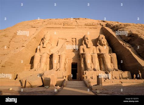 Entrance of the main temple of Abu Simbel at sunrise Stock Photo - Alamy