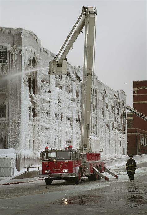 Chicago firefighters fight fire, freezing conditions