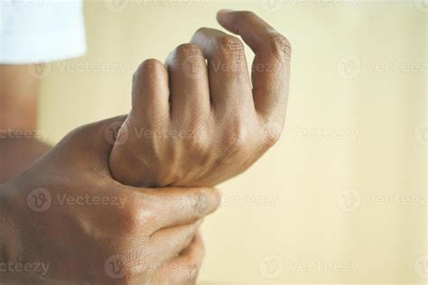 man suffering pain in hand close up 39669290 Stock Photo at Vecteezy