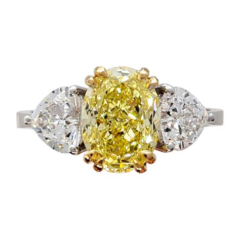 Platinum and 18k Yellow Gold Fancy Yellow Diamond with White Diamonds