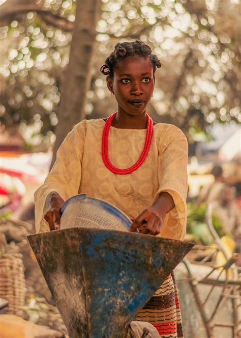 traditional african market scene  woman  stock photo