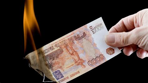Russia tells state exporters to sell forex revenues to help ruble: paper