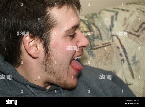 sticking  tongue stock photo alamy