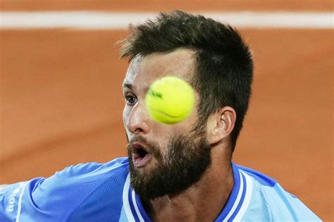 corentin moutet   underarm serve rules  french open