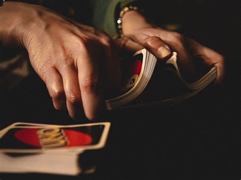 Person Shuffling Uno Cards · Free Stock Photo