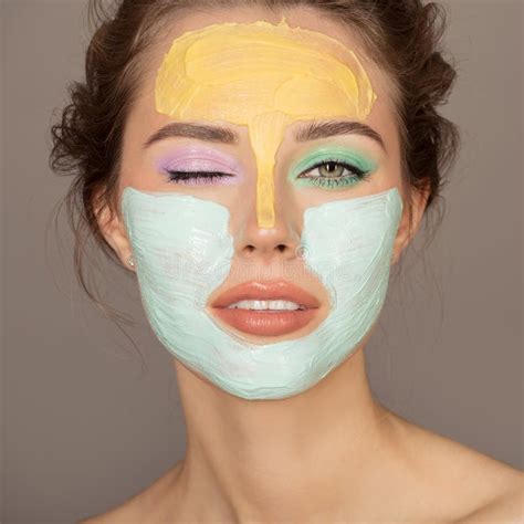 Beautiful Woman with Colorful Cream Mask on Her Face Stock Photo ...
