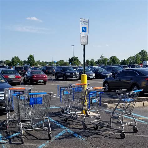 Walmart shoppers using handicapped spaces as a cart drop-off : r/trashy