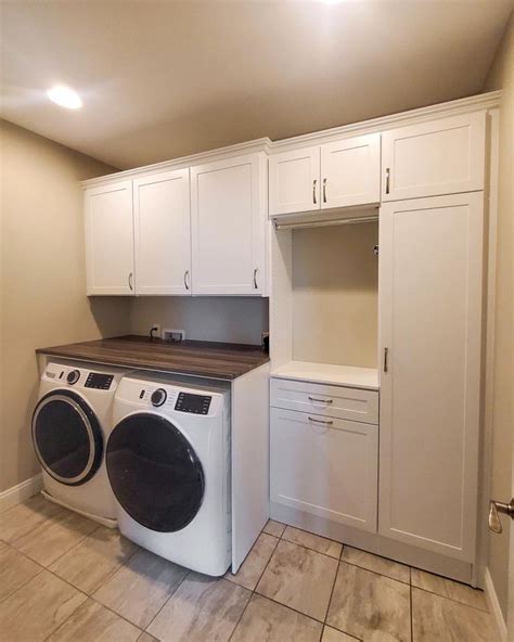 Laundry Room Wall Unit With Cabinets, Folding Station, Hanging Space ...