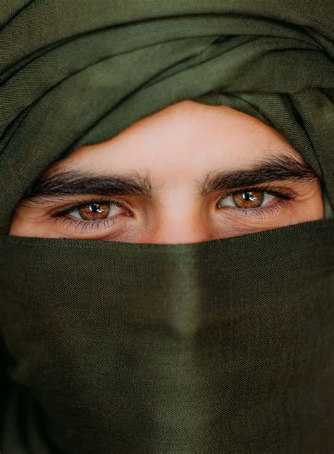 Download Arab Man Beautiful Brown Eyes Wallpaper | Wallpapers.com
