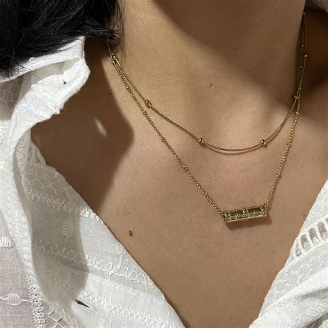 bali necklace unique tubecylinder shaped charm depop