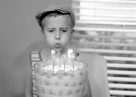 blowing out candles - Raising Roberts