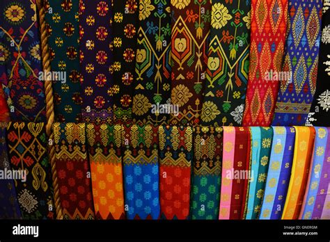 Traditional fabrics from Sarawak sold in the Kuching market Stock Photo ...