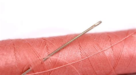 premium photo sewing thread  needle