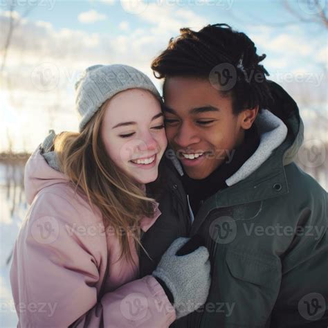 Loving teenage interracial couple is enjoying a romantic winter day AI