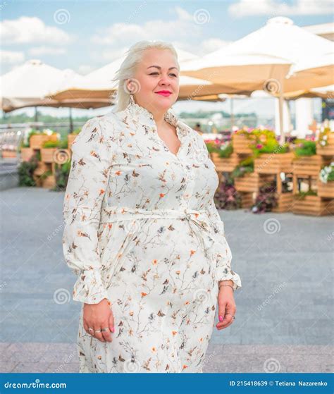 Attractive Plus Size Blonde Woman in Modern Style Stock Image - Image