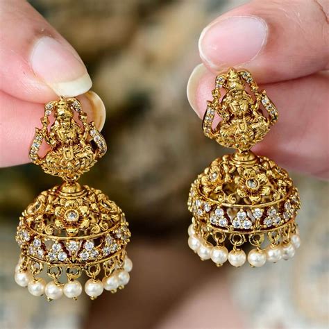 fj real gold  antique finish lakshmi screwback jhumkas