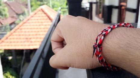 sejarah gelang benang tridatu  bali aum