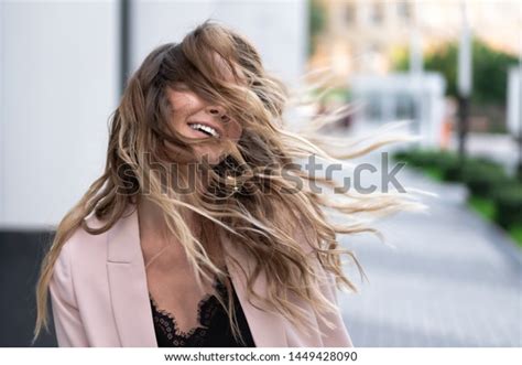 how to keep hair from flying in the wind