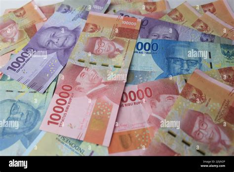 Indonesian Rupiah Money 100,000, 50,000 and 10,000 IDR banknotes. Top ...