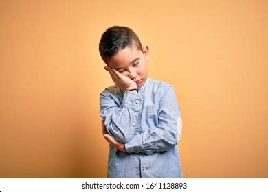 young boy  tired images stock   objects