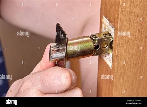 installation   brass door lock latch  handles stock photo alamy