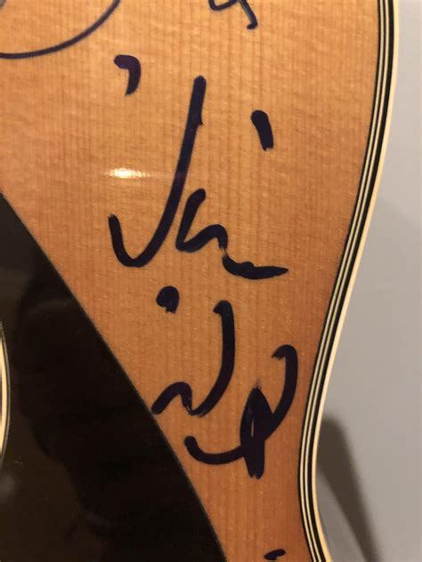 Any idea who's autograph this is? It's on a guitar with a number of ...