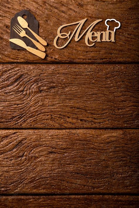 Restaurant menu. Top view of wooden menu on rustic wooden table with ...