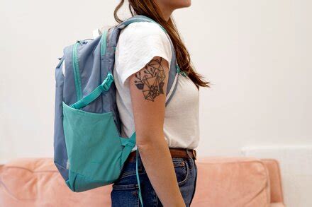 wear  backpack properly newspaper