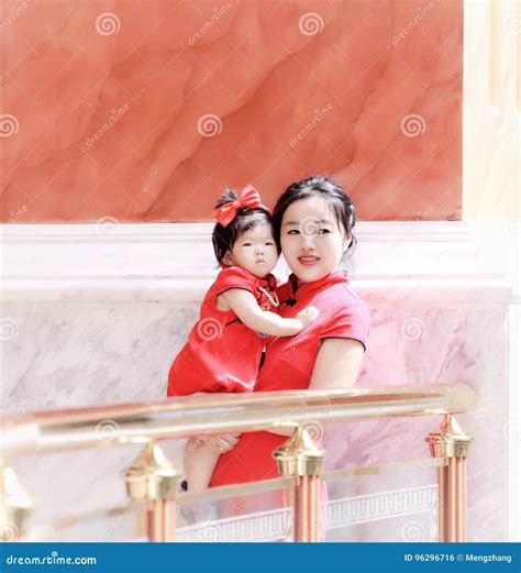 Happy Family Young Chinese Mother Has Fun with Baby in China