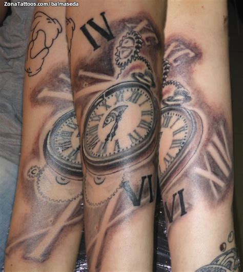 tatuaje de relojes numeros romanos