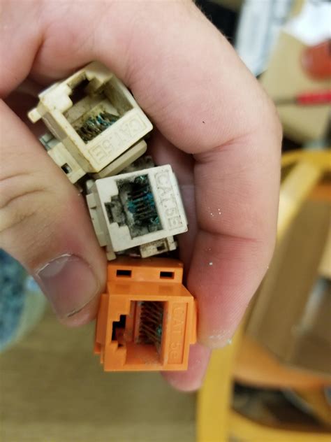 Salt corrosion on RJ45 Ethernet jacks. : r/techsupportgore