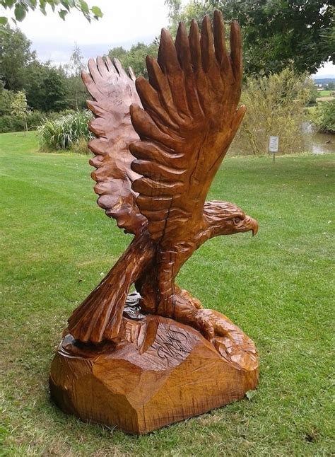 life sized Eagle carved in Oak | Chainsaw carving, Tree carving, Carving