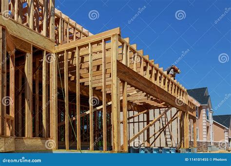 Building The Frame Of A Wooden House. Stage Of The Erection Of The Wall ...