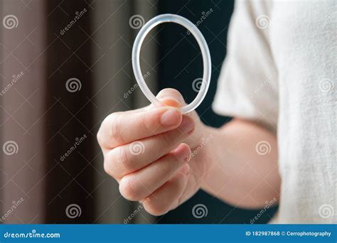 Woman`s Hand Holding a Birth Control Ring, Vaginal Ring for ...