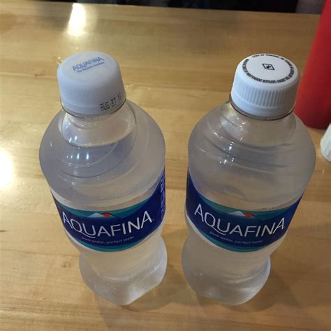 These two new Aquafina bottles came with different caps : r