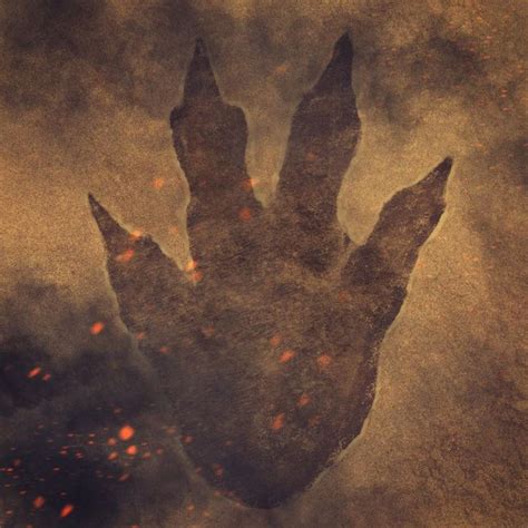 an image of a hand reaching out from the ground with fire coming out of it