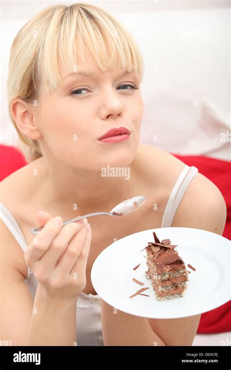 Eating chocolate cake Stock Photo - Alamy