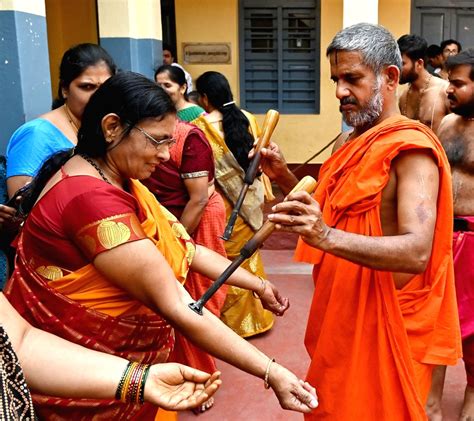 Devotees take part in 'Tapta Mudra Dharana' ritual at Sosale Vysaraja Mutt