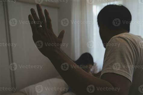 Upset woman having a fight with a man at home. Hispanic wife slapping