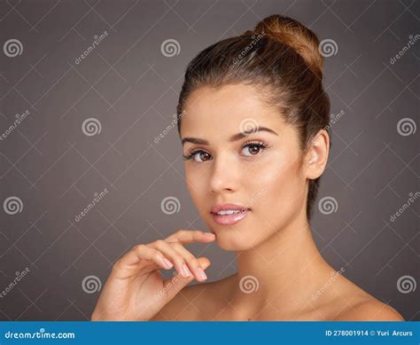 Confidence - the Ultimate Reflection of Beauty. Studio Portrait of a