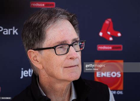 boston red sox owner john henry  red sox chairman tom werner hold