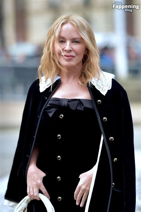 Kylie Minogue Looks Sexy in Black Pantyhose at the Miu Miu Show in
