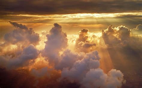 Download A breathtaking view of a deep blue sky with towering clouds ...