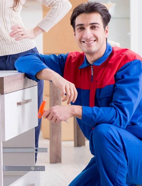 man fixing appliances stock  royalty  man fixing appliances