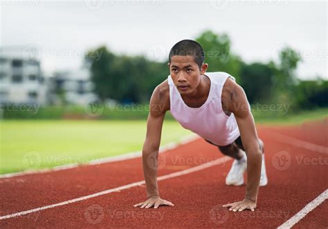 Athletes sport man runner wearing white sportswear to push up