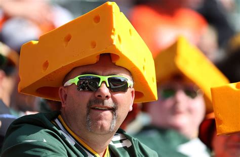 Why do Green Bay Packers fans wear cheese hats?